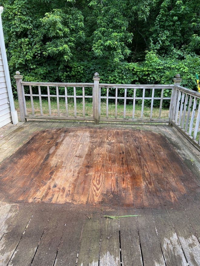 The same deck with the hot tub gone and the boards swept clean